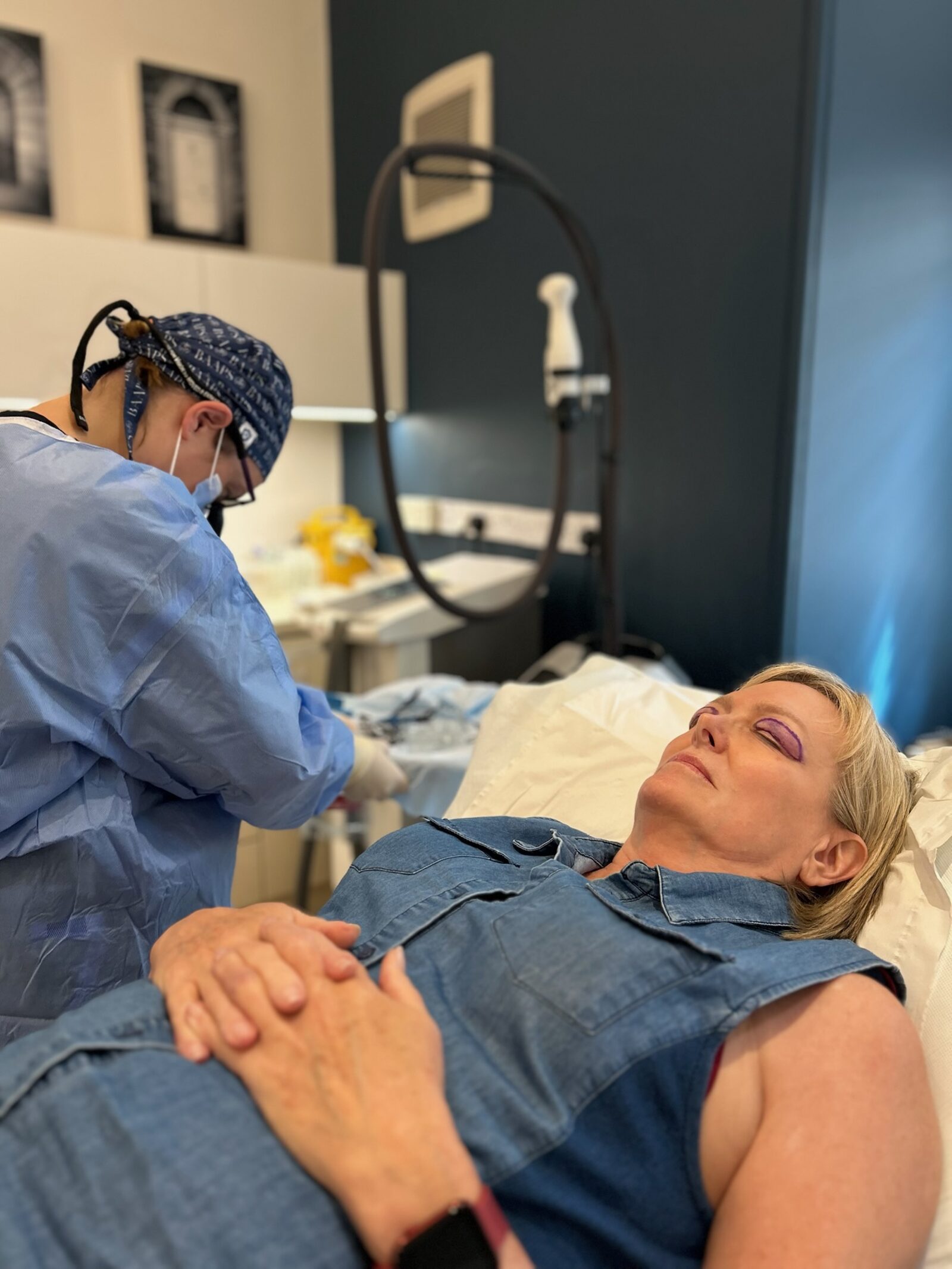 Surgeon with a patient at Bloomfield Laser Clinic